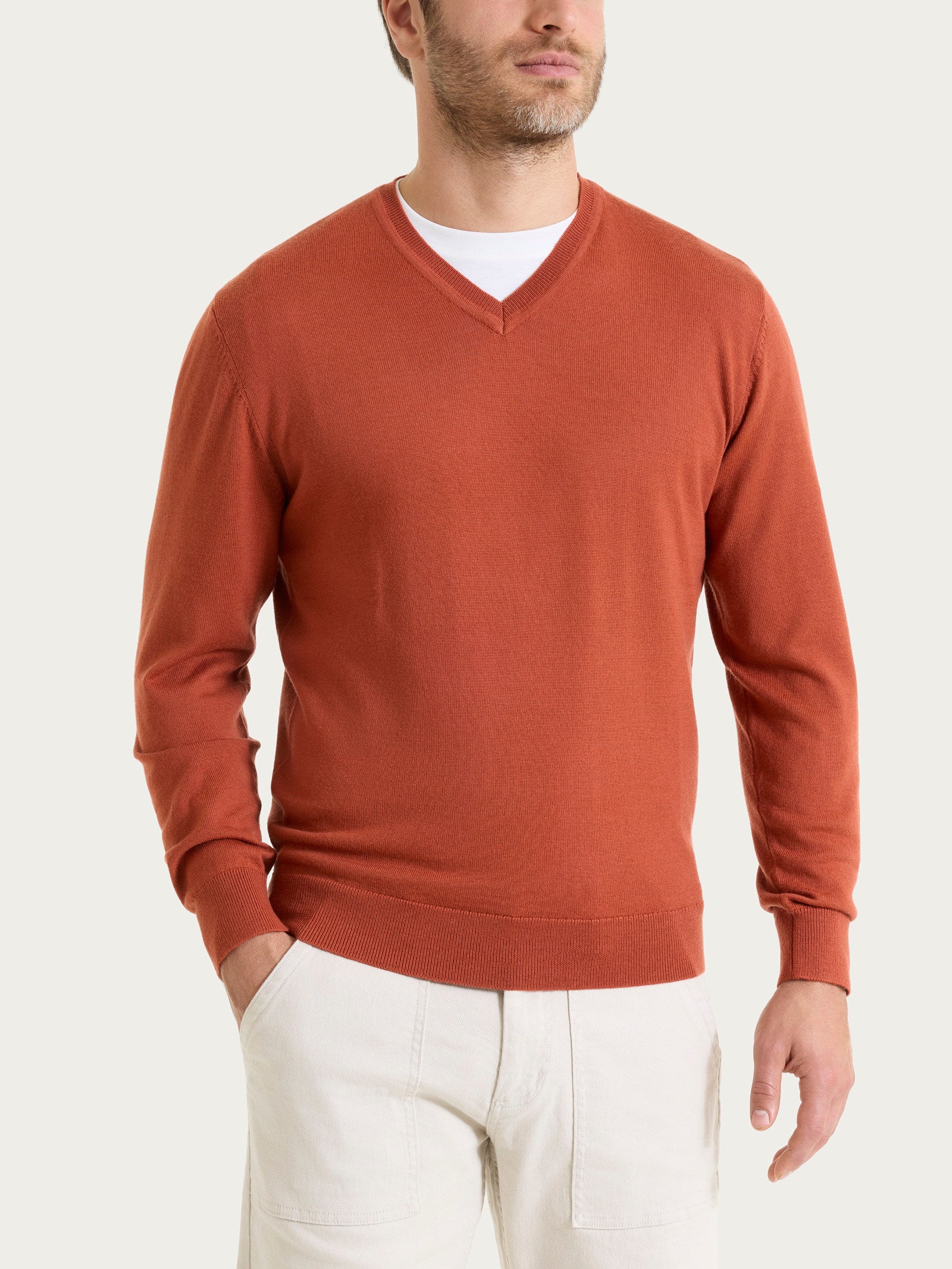 Pull con scollo a V in maglia unita in Merino Soft - Rust